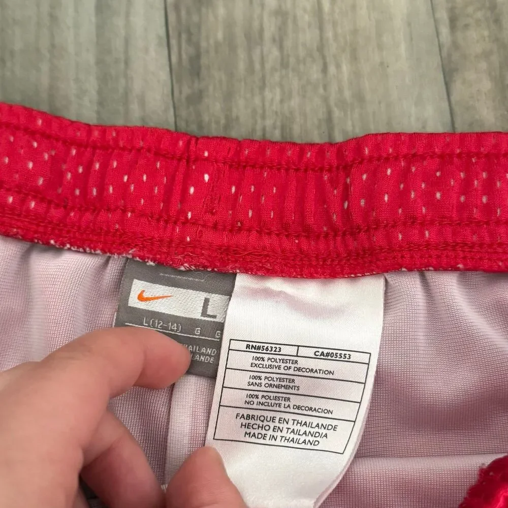Vintage retro Nike red mesh shorts with blue piping